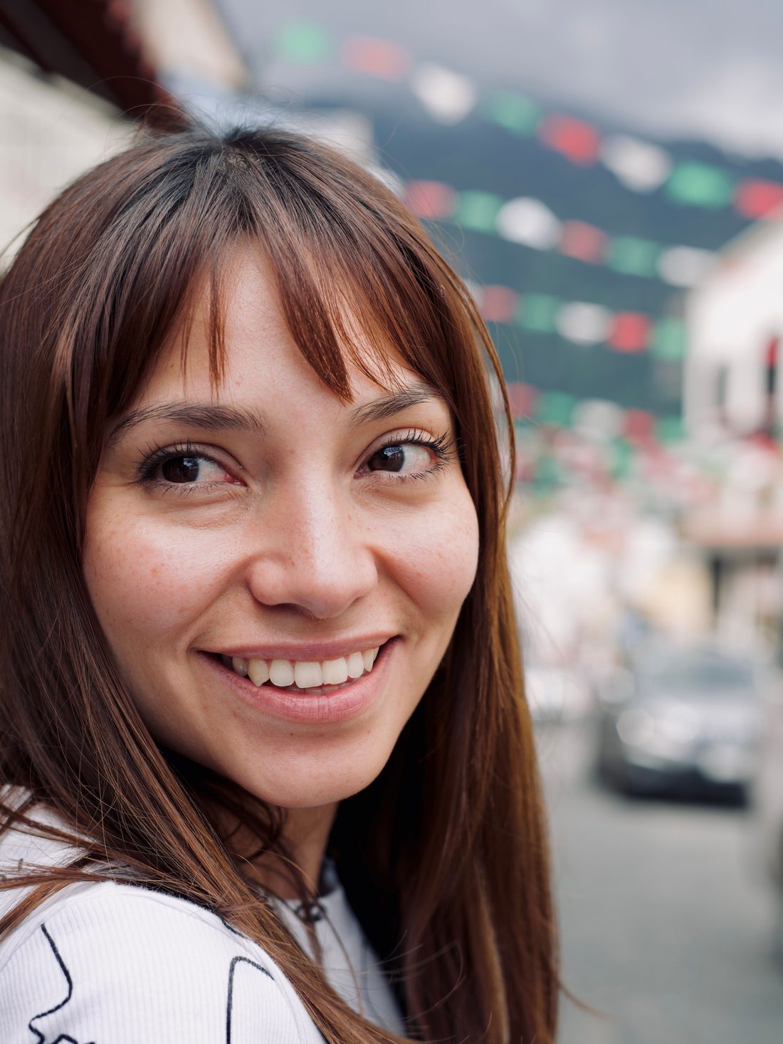 Woman sitting outdoors, representing support for SIBO symptoms in women at the Edinburgh Centre for Functional Medicine